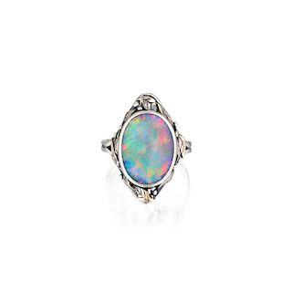 A Silver and 14K Gold Lightning Ridge Opal Ring