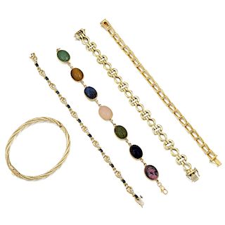 A Group of Gold and Colored Stone Bracelets