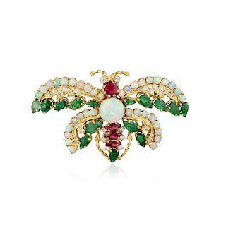 An 18K Gold Opal Ruby Emerald and Diamond Brooch