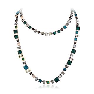 An 18K Gold and Silver Gemstone Necklace