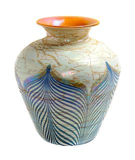 A Durand Iridescent Threaded Vase Height 12 inches.