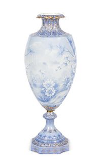 * A Continental Porcelain Urn Height 32 1/2 inches.