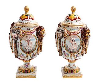 * A Pair of Capodimonte Urns Height 15 1/2 inches.