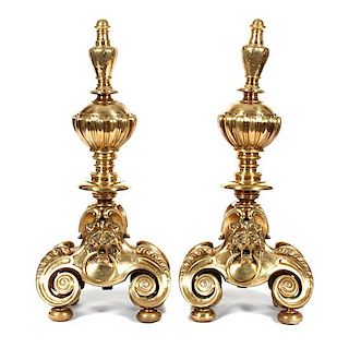 A Pair of Brass Andirons Height 37 1/2 inches.