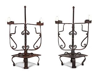 A Pair of Wrought-Iron Two-Light Candelabra Height 19 x width 11 inches.