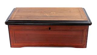 * A Continental Music Box Height 5 x width 14 x depth 7 1/2 inches.