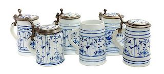 A Group of Six German Blue and White Porcelain Steins Height of tallest 7 inches.