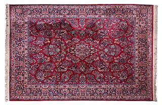 * A Large Wool Persian Rug 8 feet 8 inches x 10 feet 3 inches.