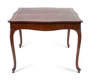 A George III Mahogany Games Table Height 29 x width 35 3/5 x depth 17 1/2 inches.