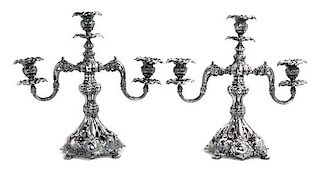 A Pair of American Silver Plate Three-Light Candelabra, Reed and Barton, Taunton, MA, each with foliate decoration.