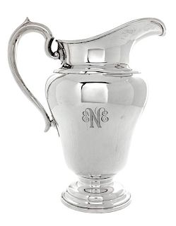 * An American Silver Water Pitcher, Watrous Mfg. Co., 20th century, monogrammed.