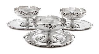 * A Set of Peruvian Silver Sorbet Cups and Plates, Camusso, Lima, Mid 20th Century, comprising eight cups, each raised on foot w