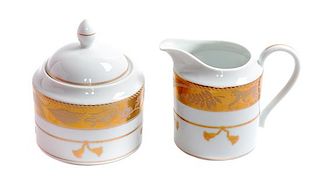 * A Lynn Chase Porcelain Creamer and Sugar Bowl Height of creamer 4 inches.