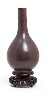 A Chinese Iron Rust Glaze Bottle Vase, Height 6 3/4 inches.