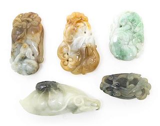 A Group of Five Carved Jadeite Toggles, Width of widest 2 3/8 inches.