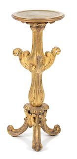 An Italian Rococo Style Carved Giltwood Pedestal Height 30 inches.