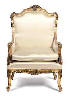 A Louis XV Style Giltwood Bergere Height 42 1/4 inches.