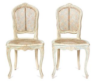 A Pair of Louis XV Cane Back Painted Side Chairs Height 35 1/2 inches.