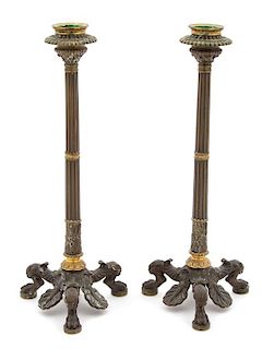 A Pair of Louis XVI Style Bronze Candlesticks Height 10 1/2 inches.