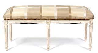 A Louis XVI Style Painted and Upholstered Bench Height 20 x width 41 x depth 17 inches.