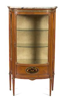 A Louis XVI Style Gilt Metal Mounted Walnut Vitrine Cabinet Height 55 x width 31 x depth 13 1/2 inches.