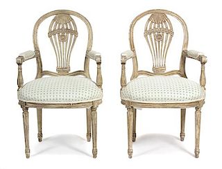 A Set of Four French Painted Mongolfier Armchairs Height 37 3/4 inches.