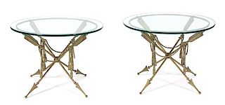 A Pair of Regency Style Arrow-Form Bronze and Glass Top Side Tables Height 18 1/2 x diameter 26 inches.