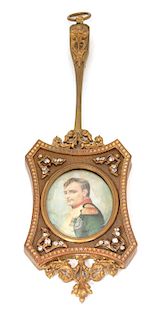 A French Gilt Bronze and Jeweled Framed Miniature of Napoleon I Overall length 9 1/8 inches.