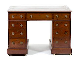 A George III Mahogany Pedestal Desk Height 28 1/2 x width 31 1/4 x depth 26 1/4 inches.