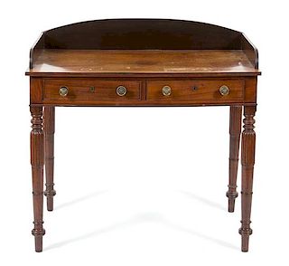 A Regency Style Mahogany Dressing Table Height 35 x width 36 1/4 x depth 23 inches.