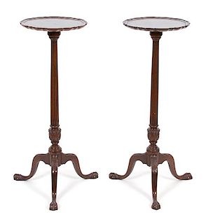 A Pair of George III Style Carved Mahogany Pie Crust Top Pedestal Stands Height 37 x diameter 13 1/2 inches.
