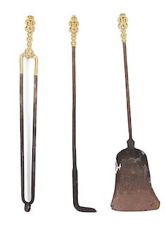 Three Georgian Brass Handled Fire Tools Length 30 inches.