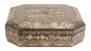A Regency Style Chinoiserie Decorated Lacquer Box Height 4 x length 15 x depth 12 1/4 inches.