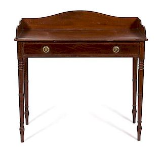 A Regency Mahogany Side Table Height 37 1/2 x width 39 x depth 21 3/4 inches.