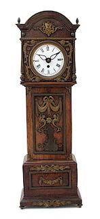 A Gilt Bronze Mounted Oak Miniature Tall Case Clock Height 23 1/2 x width 8 x 4 3/4 inches.