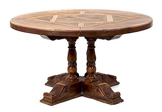 A William IV Style Carved Mahogany Center Table Height 30 x diameter 54 inches.