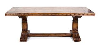 A William IV Style Carved Mahogany Library Table Height 29 1/2 x width 84 1/2 x depth 27 3/4 inches.
