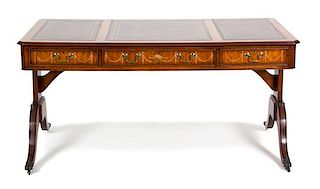 An Edwardian Style Mahogany Writing Desk Height 30 1/2 x width 61 1/2 x depth 34 inches.