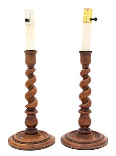 A Pair of English Walnut Barley Twist Candlestick Lamp Bases Height of candlestick 13 1/4 inches.