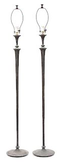 A Pair of Cast Metal Floor Lamps after J. T. Jones. Height 59 1/2 inches.