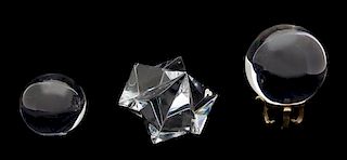 Three Crystal Paperweights Height of largest 5 inches.
