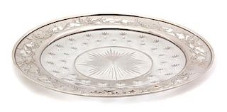 * An American Silver Rimmed Cut Glass Dish, 20th Century, having star burst design