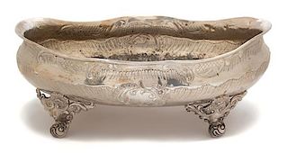 A Continental Silverplate Jardiniere Height 7 3/4 x width 20 x depth 14 3/4 inches.