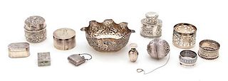 A Miscellaneous Collection of Silver, Various Makers, including 3 vinaigrettes, 2 napkin rings, 2 covered boxes, a locket, a tea
