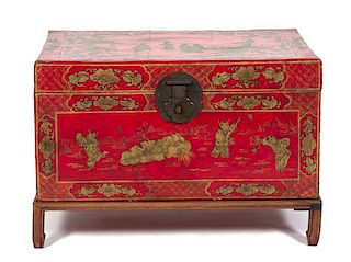 A Chinese Red and Gilt Lacquer Bride's Box Height 15 x width 29 x depth 20 1/2 inches.