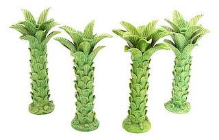 A Group of Four Madelaine Ryan Ceramic Palm Tree Candlesticks Height 12 inches.