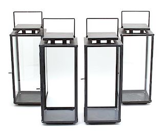 Four Glazed Metal Table Lanterns Height 18 3/4 inches.