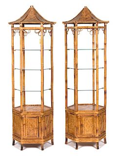 A Pair of Rattan Pagoda-Form Etageres Height 77 x diameter 21 inches.