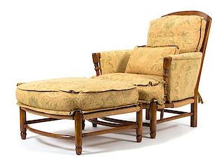A Colonial Style Walnut Open Armchair and Ottoman Height 38 inches.
