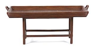 A Brown Rattan Tray Top Coffee Table Height 24 x width 53 x depth 23 1/2 inches.